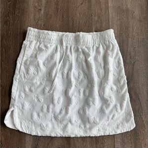 Disney Minnie Mouse Skirt.  White with bows.  Women’s size small. Like new!